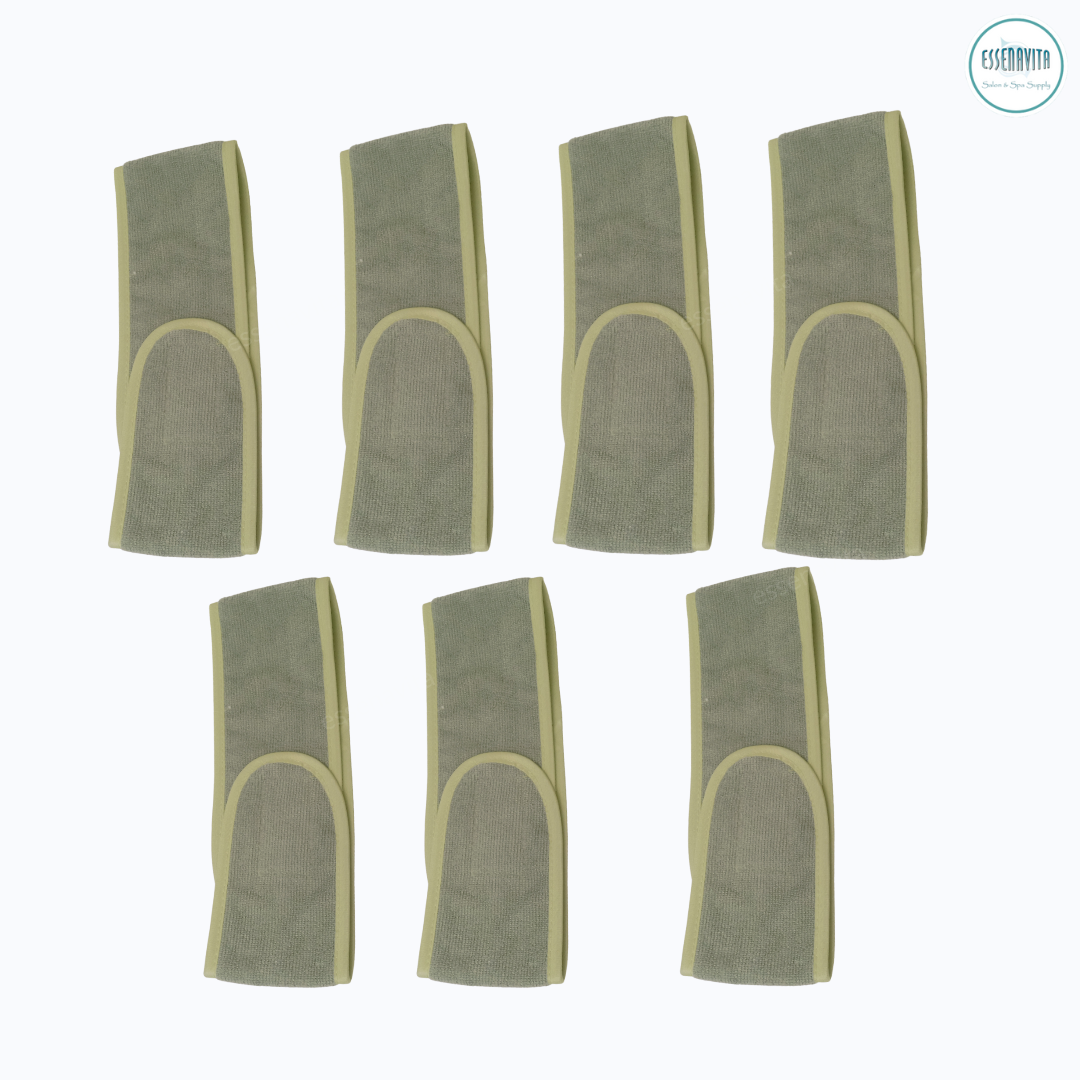 Set of 7 olive microfiber spa headbands stacked, closed on white background