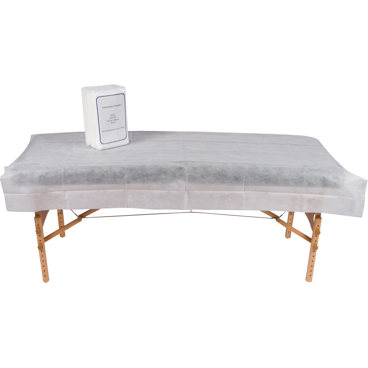 A disposable non woven bed sheet white, covering a full sized portable massage table draping the whole table