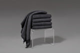 dark grey fromm softees plush microfiber towels folded on acrylic stand 6 pack 20x30 salon spa