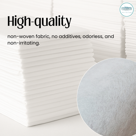 Stack of non-woven disposable spa bed sheets with close-up fabric texture detail