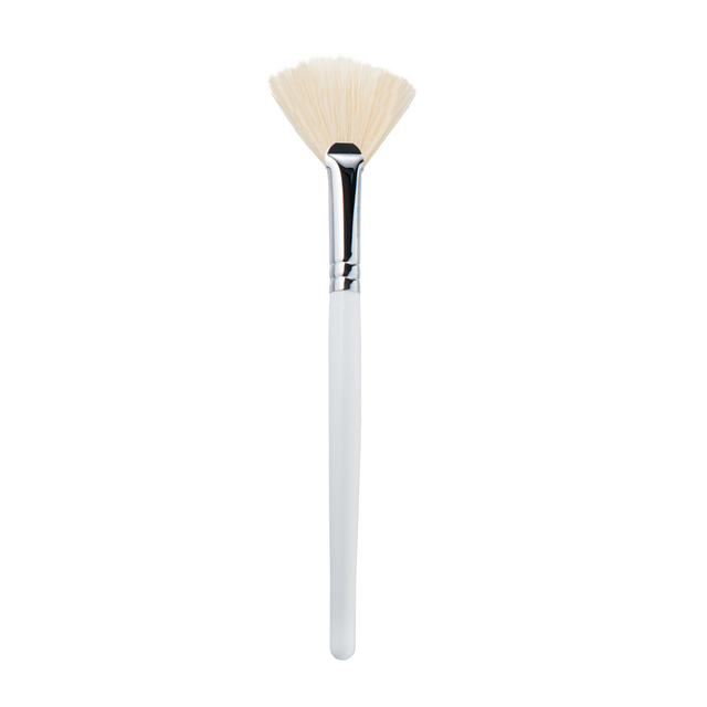 White wooden handle fan mask brush with natural boar bristles for professional esthetician clay and facial mask application